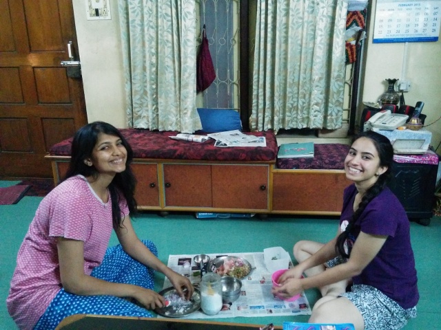 Nisha and Komal getting ingredients ready for aalu paratha